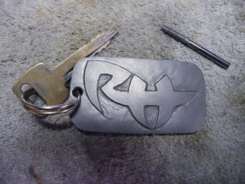 Carved Ti Tag #2.jpg