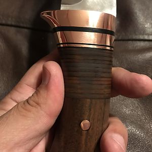 walnut and copper handle detail