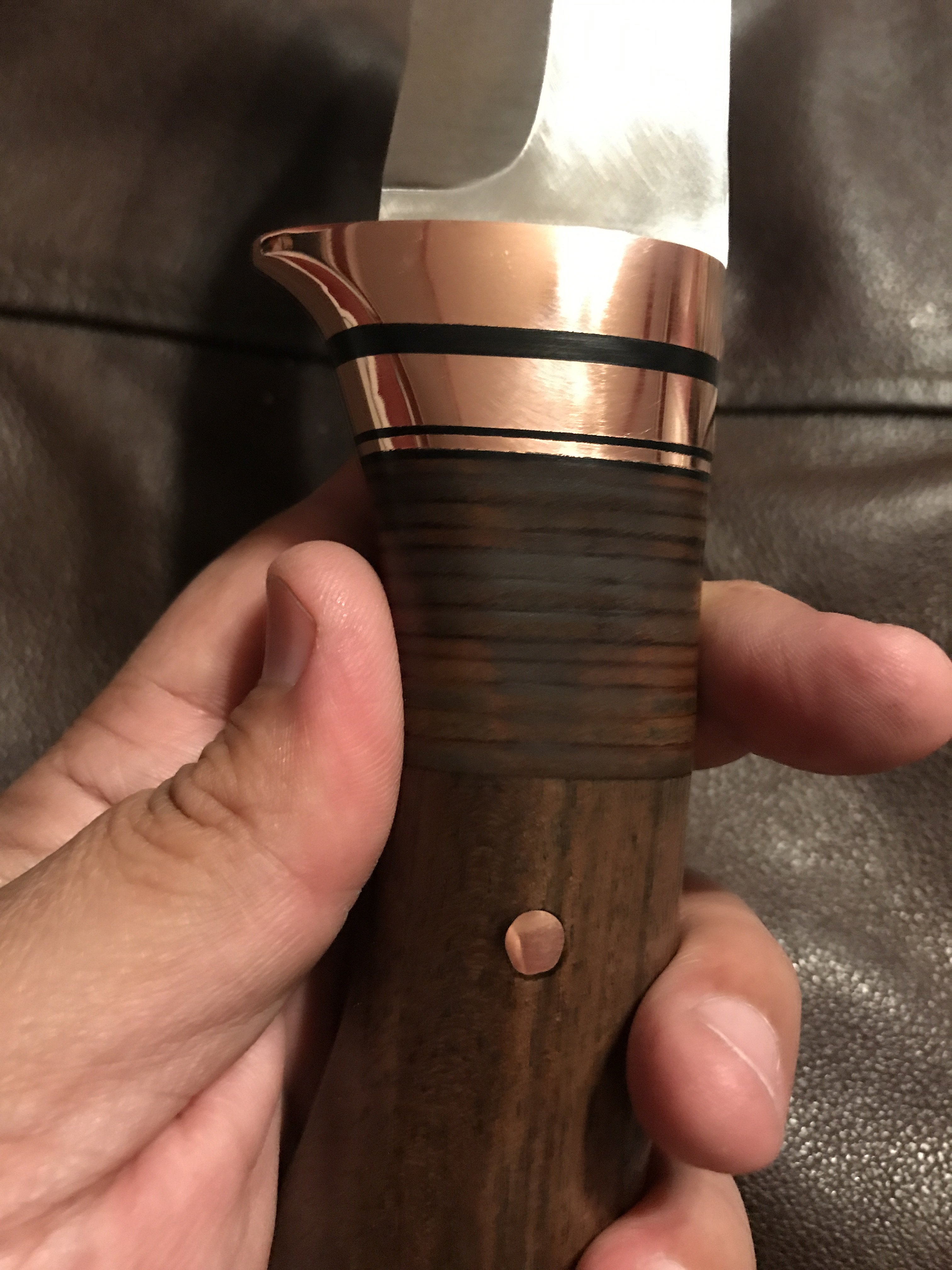 walnut and copper handle detail